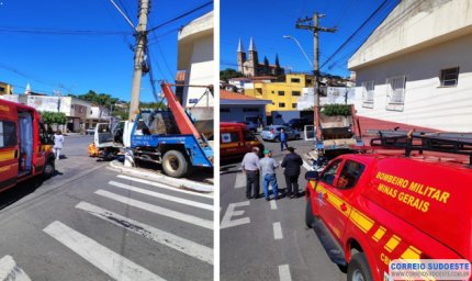Sem freio, caminhão-caçamba fica prensado entre casa e poste